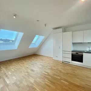 Moderne Dachgeschosswohnung mit Klima & Terrasse - Foto 1