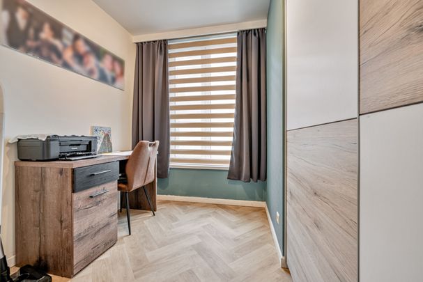 Gelijkvloers appartement met zonnig terras en aparte garage! - Foto 1
