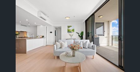 Contemporary Two-Bedroom Apartment with Panoramic River Views - Photo 4