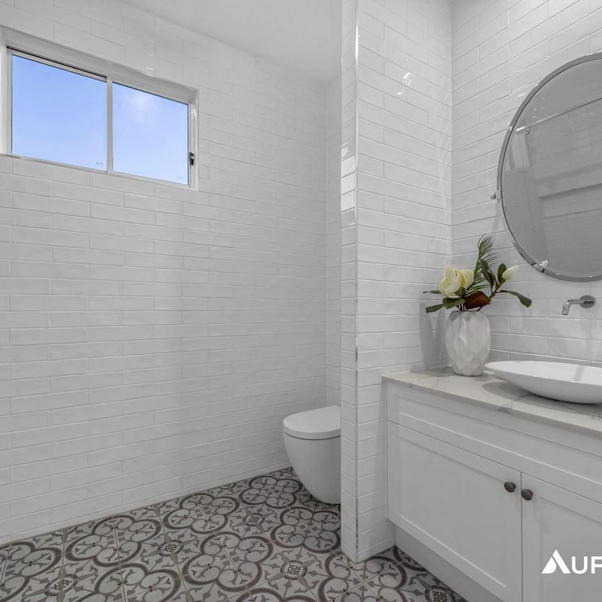 Sophisticated Hamptons-Inspired Family Home - Photo 1