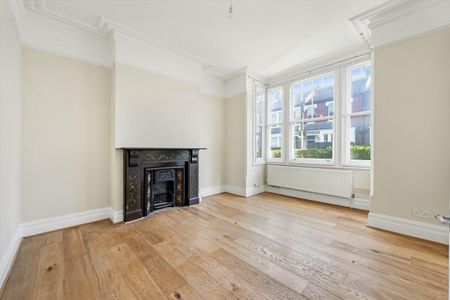 An attractive and spacious family home situated on one of Battersea’s most desirable residential streets - Photo 4