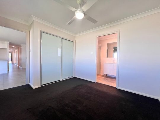 NEAR NEW 4 BEDROOM HOME - Photo 1