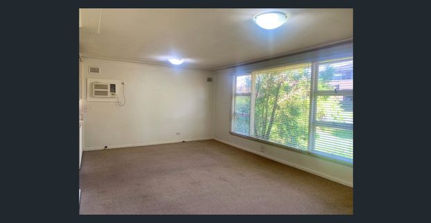 Spacious 4-Bedroom Home - Photo 1