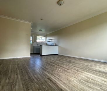 Brick 2-Bedroom Unit in Convenient Location - Photo 1