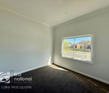 RENOVATED 2 BEDROOM UNIT - LAWN MAINTENANCE INCLUDED - Photo 1