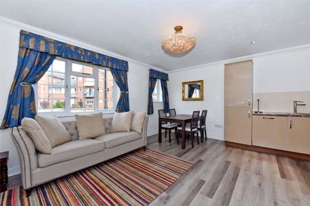 A first floor furnished two bedroom apartment with lift and car parking in a sought after Windsor town development. - Photo 4