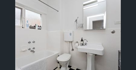 Perfectly Located Oversized 2 Bedroom Apartment - Photo 2