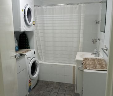 Experience Comfort and Convenience in a Beautiful Coastal Town - Photo 6
