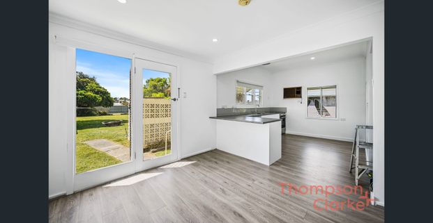 Freshly Renovated & Close to Town - Photo 1