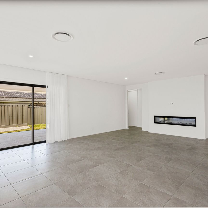 Brand New Luxury Home in Sought After Horsley - Photo 1