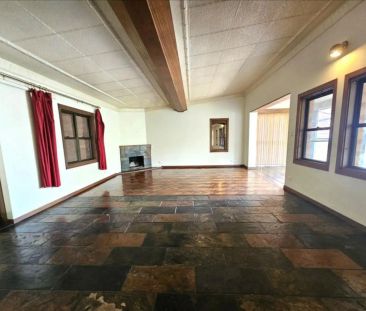“Elevated 2-Bedroom Home with Spacious Sunroom and Large Balc” - Photo 2