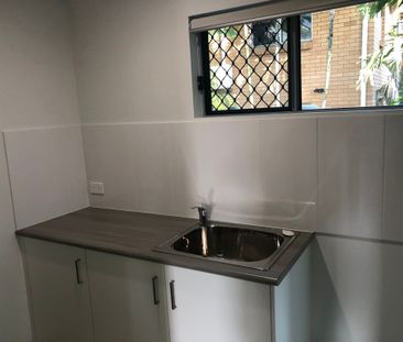 Fully fenced low maintenance yard - Photo 1