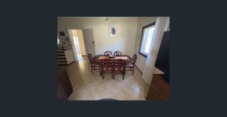 Charming 2-Bedroom Home with Sunroom and Lovely Gardens - Photo 4