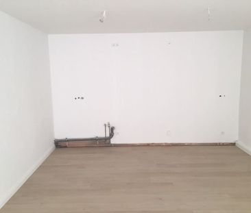 Modernisierte Wohnung mit gerÃ¤umiger Wohn-Ess-KÃ¼che in Stadtmitte - Photo 4