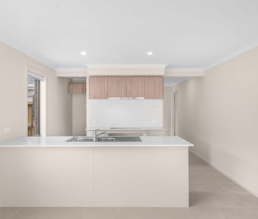 Brand-New Comfort in Growing Beveridge - Photo 3