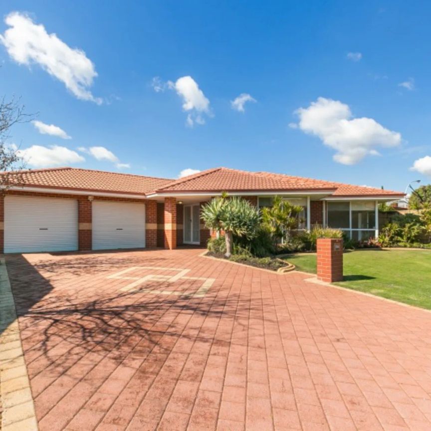 Spacious Four Bedroom Home in a Prime Location! - Photo 1