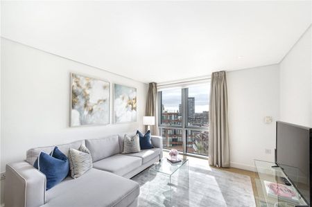 A stunning three bedroom interior designed apartment located on the 8th floor within this prestigious development set within the heart of the Paddington Basin. EPC Rating B | Council Tax Band G - Photo 2