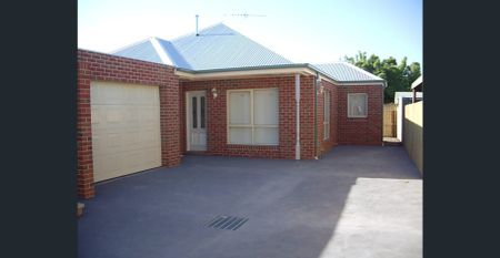 Low maintenance home in a great location - Photo 2