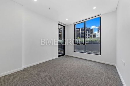 Oversized 2-Bedroom Apartment | Heart of Green Square | Luxury Marble & Resort Living - Photo 2