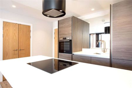 A two bedroom home with a private balcony, under croft parking for two cars and store, located in the heart of Salisbury - Photo 4