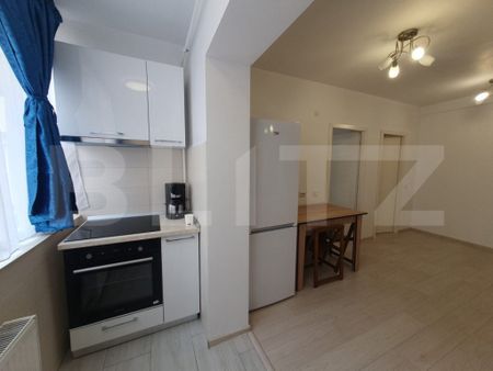 Apartament modern cu 2 camere, parcare privată, cartierul 1 - Fotografie 2