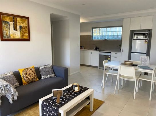 Modern 2 Bedroom Unit available soon, $750/week - Photo 1