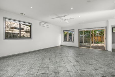 Spacious Living with Entertainer’s Backyard & Flexible 5th Bedroom - Photo 4