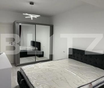 Prima închiriere: Apartament ultrafinisat cu 2 camere, parcare privată, zonă centrală - Photo 5