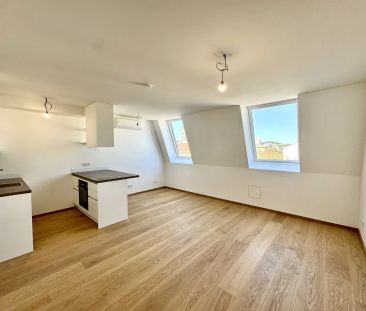 Erstbezug: lichtdurchflutete 2-Zimmer-Maisonette-Dachgeschosswohnun... - Foto 3