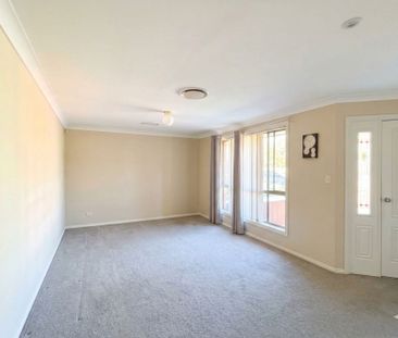 Spacious Family Home in a Prime Glenmore Park Location - Photo 5