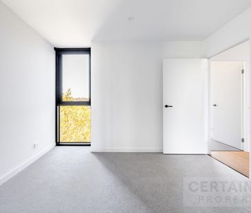 Contemporary Apartment Living in a Convenient North Melbourne Location - Photo 2