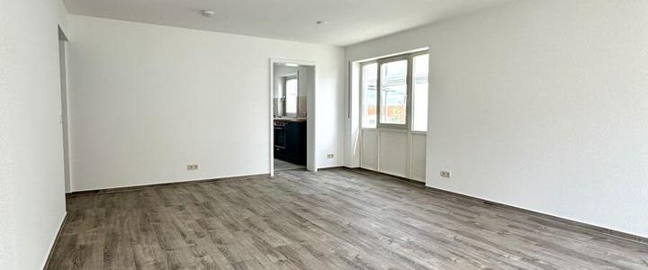 Moderne Traumwohnung mit EBK, Südbalkon und TG-Stellplatz! - Photo 1