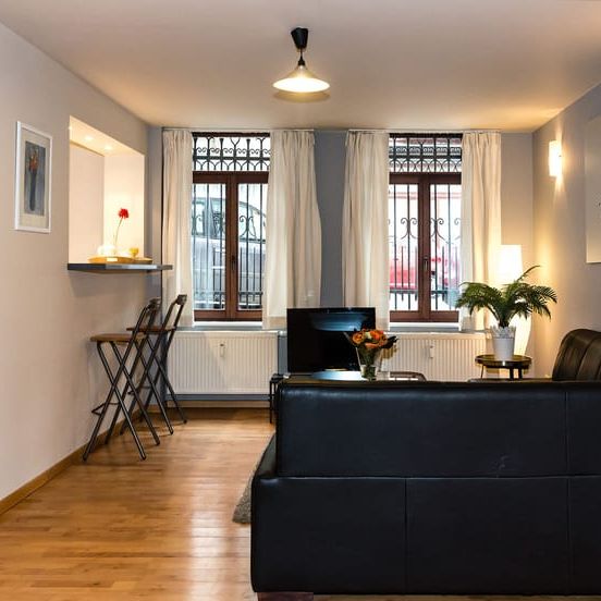 Appartement te huur - Photo 1