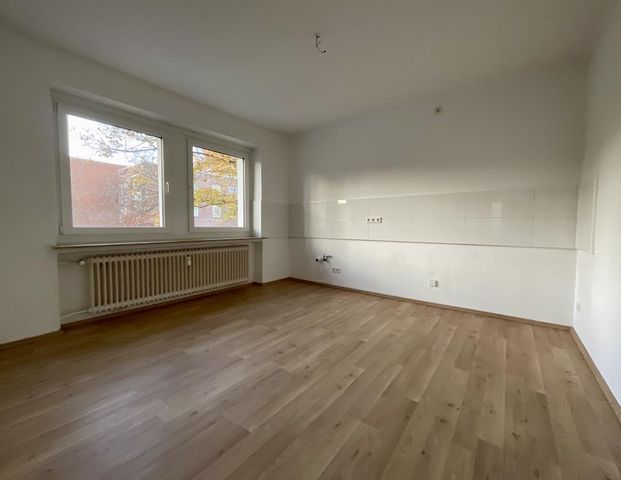 Gepflegte 3-Zimmer-Wohnung in modernisierten Mehrparteienhaus! - Foto 1