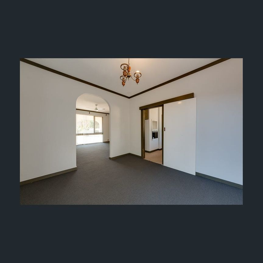 Beachside Bliss: 4BR Older Home Available Now - Photo 1