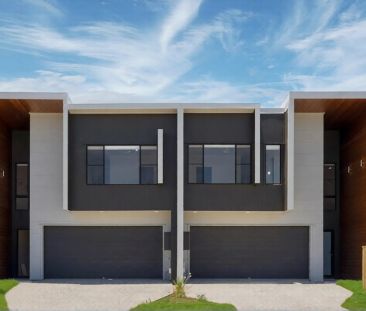 Spacious 4-Bedroom Townhome with Modern Family Living Contact Julie... - Photo 3
