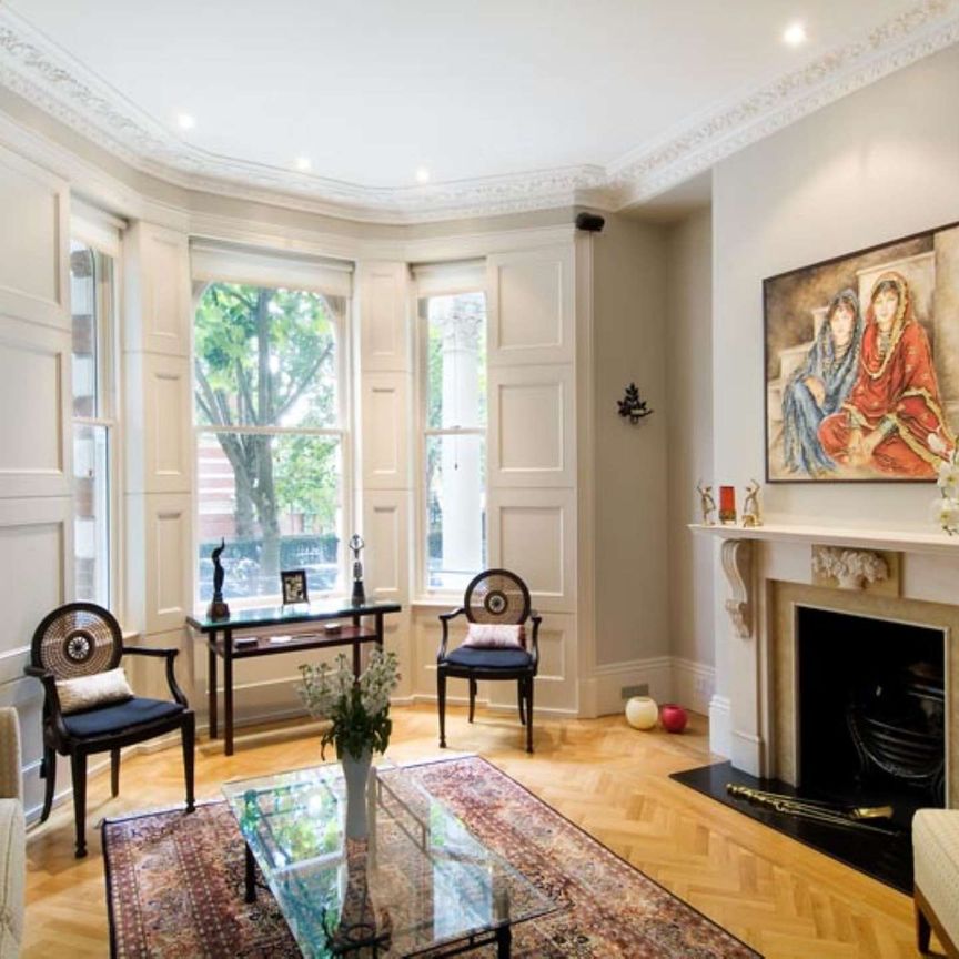 A beautiful ground floor duplex apartment offering exceptional open-plan living accommodation with a secluded terrace and underground parking. - Photo 1