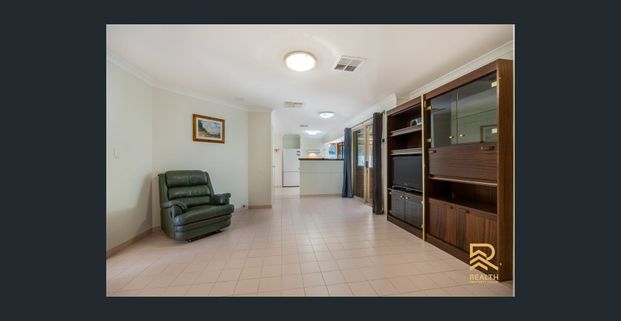 Secured Family Home in Prime Locale! - Photo 1