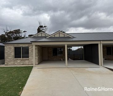 EARLY BIRD LISTING: New low maintenance home in quiet cul-de-sac - Photo 3