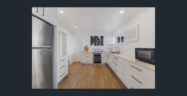 Fully Furnished Spacious Beachside Home with Pool, Dual Living & Coastal Charm - Photo 1