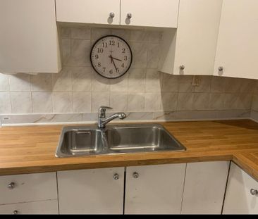 Appartement Rdc stationnement privé - Photo 2