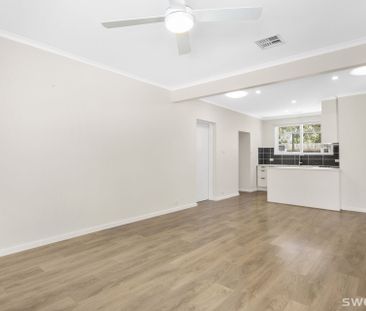 Conveniently positioned modern two bedroom unit with lock up garage - Photo 2