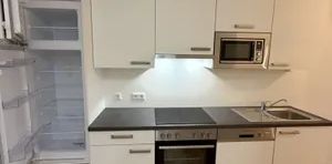 Charmante 2-Zimmer-Wohnung mit Balkon im 5. Liftstock - Foto 2