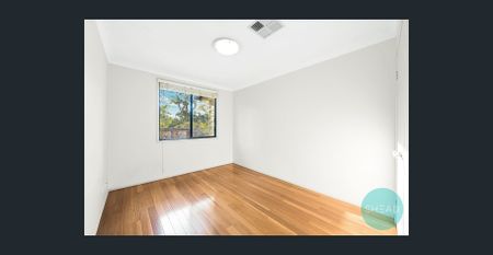 MODERN TWO LEVEL BRICK FAMILY HOME AT LEAFY LOCATION - Photo 3