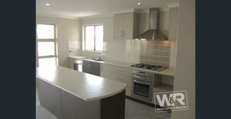MODERN & SPACIOUS 4x2 HOME IN McKAIL - Photo 2