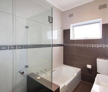 OVERSIZED ONE BEDROOM UNIT WITH LEAFY OUTLOOK - Photo 5