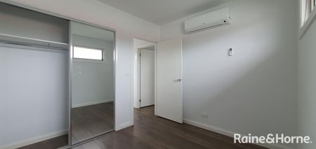 Modern Living in a Thriving Location! - Photo 3