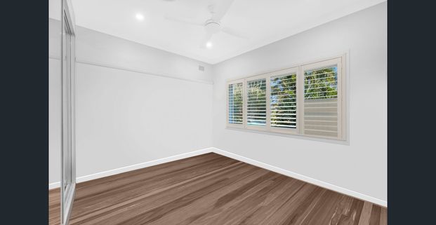 Situated in a convenient position, this renovated freestanding home - Photo 1