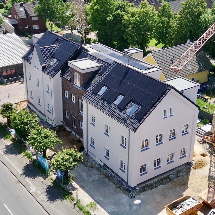 Ein architektonisches Highlight: Wohnen im historischen Schulgebäude mit modernster Technik! - Photo 1