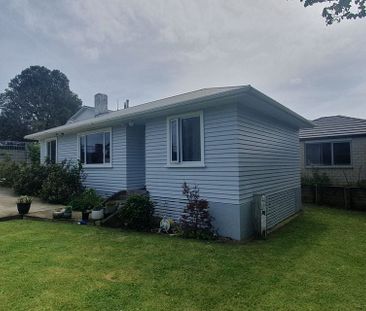 Charming 2BR Home - Photo 1